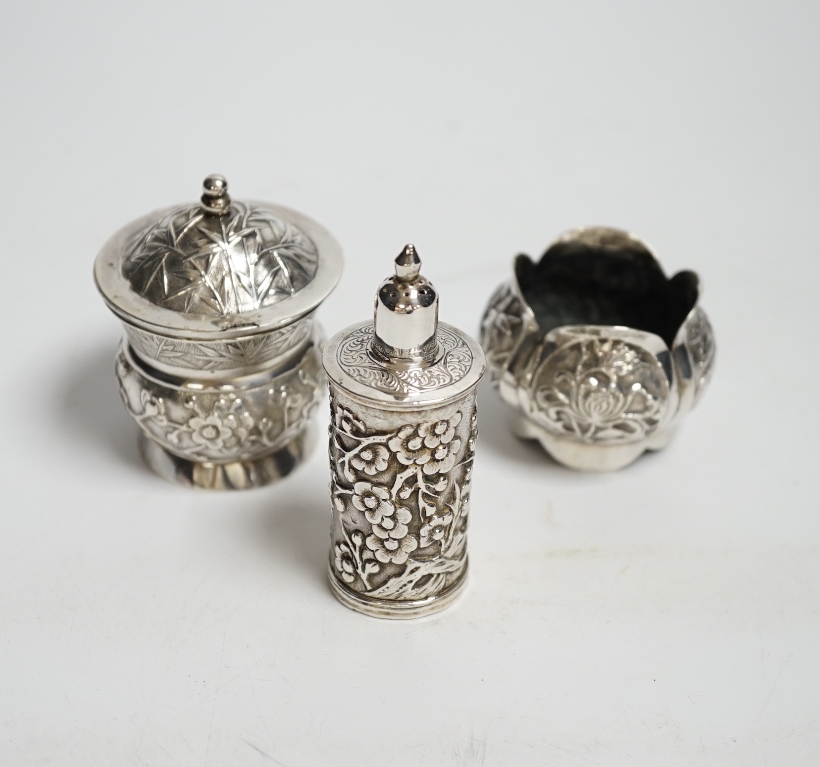 An early 20th century Chinese Export white metal three piece condiment set by Wang Hing, Hong Kong, 147 grams.